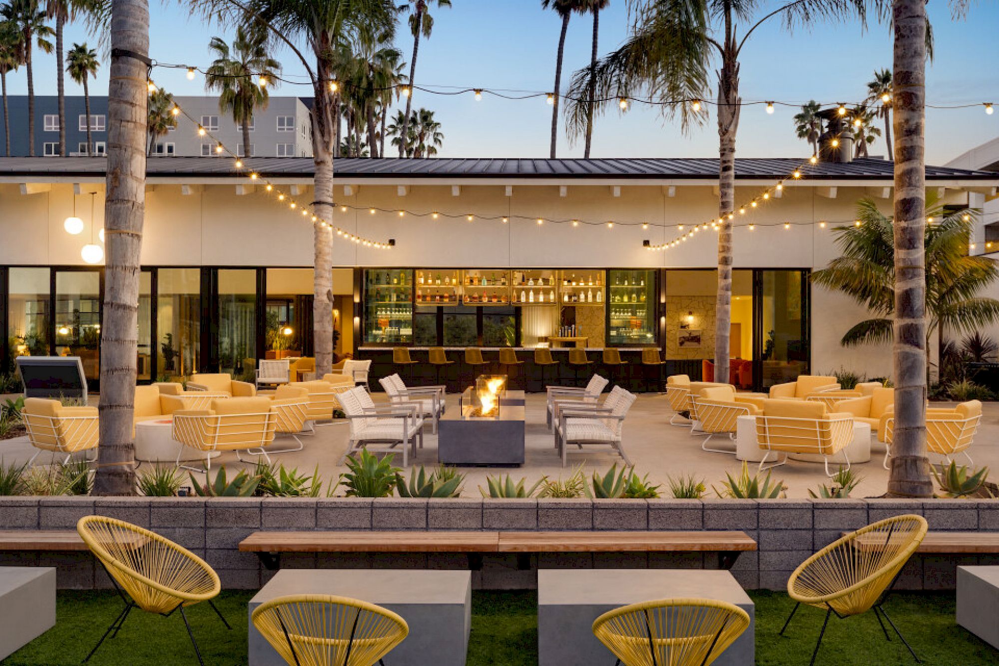 Fire pits on a outdoor patio of a modern hotel